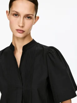 Bluse mit Falten