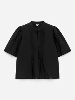 Bluse mit Falten