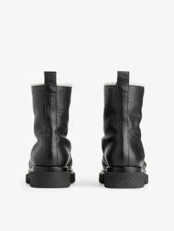 Lederstiefel mit Kunstpelz